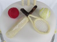 Sports Cake -  These decorations were hand made to reflect a bride & groom's sporting interest.